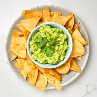 Homemade Lime Tortilla Chips with Guacamole and Salsa Roja Lunch