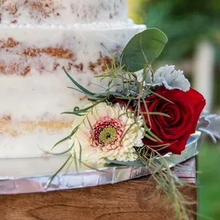 a closeup of a wedding cake