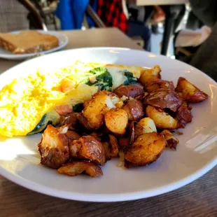 a plate of breakfast food on a table