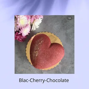 a red heart shaped cake