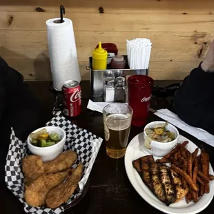(Left) Chicken tenders and veggies (Right) Salmon &amp; sweet potato fries.