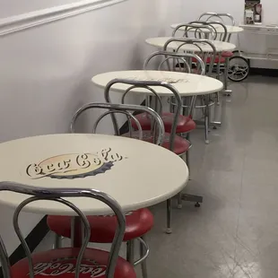 Cute 50's looking soda shop tables &amp; chairs. They also have outdoor seating.