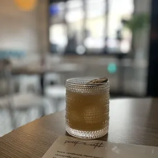  jar of honey on a table