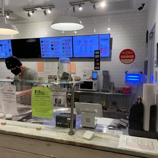 a man working behind the counter