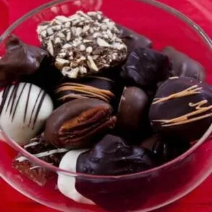 a bowl of assorted chocolates