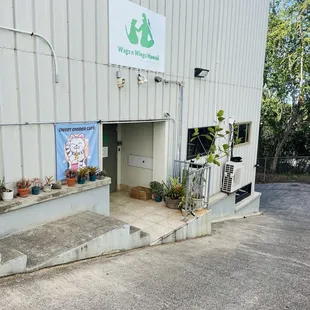 Entrance don't forget to say hello to the two black cats ‍ outside!  You can see them napping on the ac.