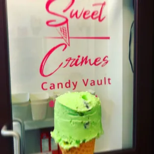 a green ice cream cone