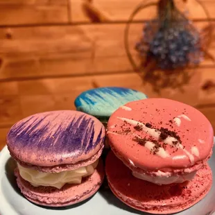 three macarons on a plate