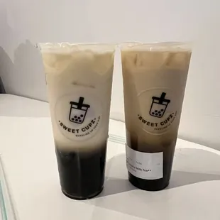 Jasmine Green Milk Tea Hojicha Milk Tea  Both are 50% sweet with boba