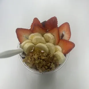 Acai bowl with honey! It originally has condensed milk but if you&apos;re lactose intolerant like me, you can ask for honey!