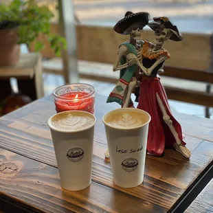 two cups of coffee on a table