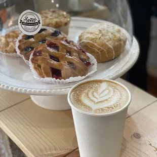 a plate of pastries and a cup of coffee