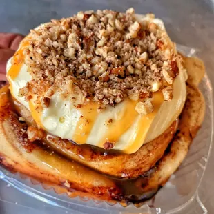 a hand holding a pastry