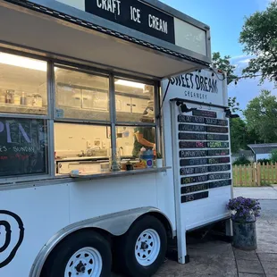a food truck parked in front of a building