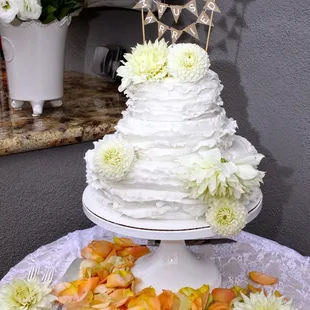 Our 3 tier ruffle wedding cake-2 tiers of Funfetti cake &amp; 1 with yellow cake &amp; vanilla buttercream!