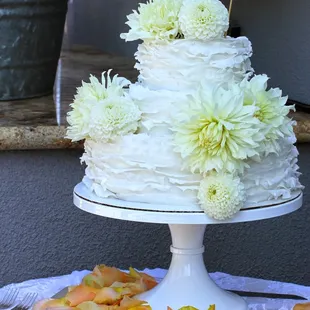 Our 3 tier ruffle wedding cake-2 tiers of Funfetti cake &amp; 1 with yellow cake &amp; vanilla buttercream!