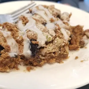 a piece of cake on a plate with a fork