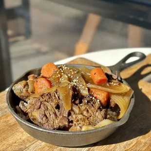 MAMA HWANG&apos;S KALBI JJIM aka STEW - Slowly braised short rib in Mama Hwang&apos;s sweet soy sauce served over rice.