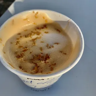 a cup of coffee on a table