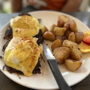 Corn Beef Hash Eggs Benedict with potatoes