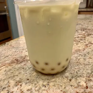 Milk tea (black tea; honeydew) with Popping Boba (mango).