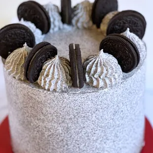 a cake with oreo cookies on top