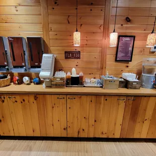 Napkins, utensils, straws, containers, lids, water. Ice tea, sauces and condiments.