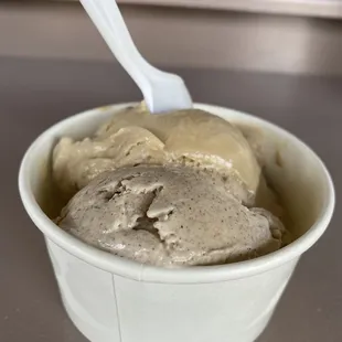 a bowl of ice cream with a spoon