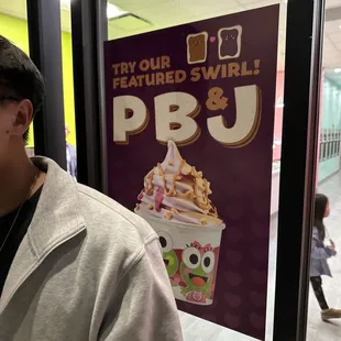 a man standing in front of a window