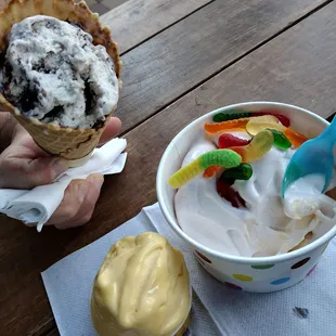 Passion fruit gelato, cookies and cream waffle cone &amp; strawberry and vanilla soft serve with gummy worms