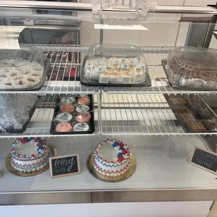 a display of cakes and pastries