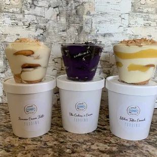 Our banana trifle, ube Oreo, and lilikoi curd puddings.