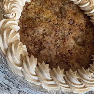 Pumpkin Crunch - A crustless pumpkin pie topped with pecans and real pumpkin n spice whipped cream.