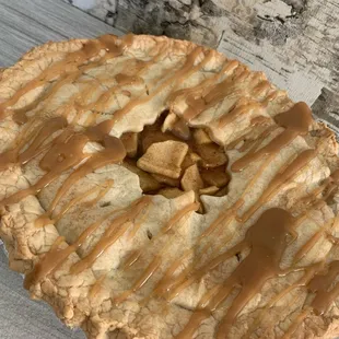 Homemade salted caramel apple pie baked in a scratch real butter pastry crust. Not overly sweet.