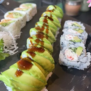 a variety of sushi and rolls