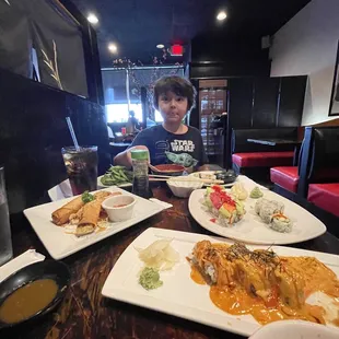 Volcano roll, California roll, Harumaki, edamame, miso soup, salad,  roll.