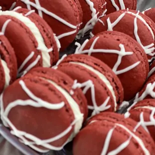 a tray of red velvet macarons
