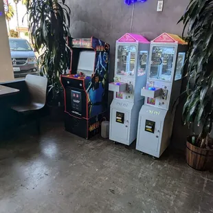 Mortal Kombat and claw machines in the near corner