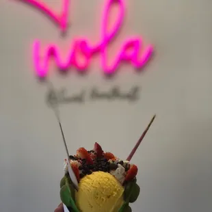 Mango ice cream with toppings and pandan waffle