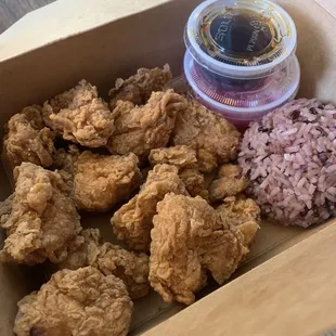 Popcorn Chicken meal comes with purple rice + choice of soy or spicy sauce on the side + pickled daikon