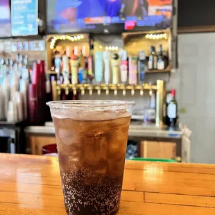 a cold beverage in a plastic cup