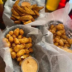Cheese curds with siracha ranch/potato wedges with Cajun seasoning