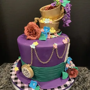 Mad Hatter- vanilla velvet cake with buttercream frosting and handmade sugar paste decorations on fondant