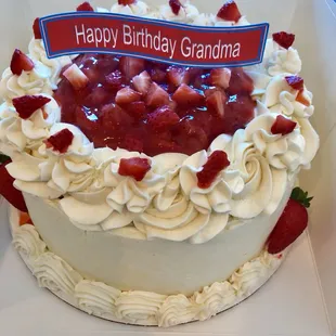 Vanilla cake with strawberry topping and filling