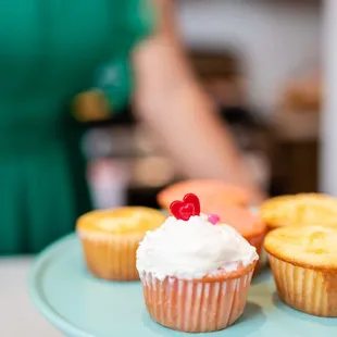a plate of cupcakes