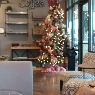 The Christmas tree was a beautiful addition to the place.