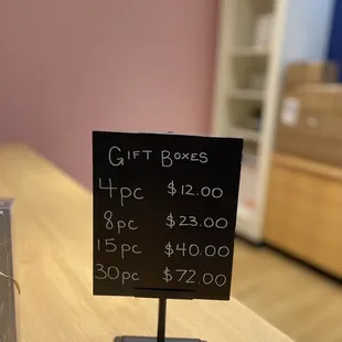 a gift box and a sign