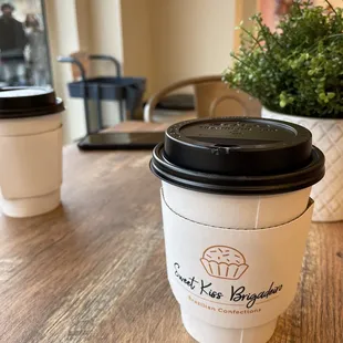 a cup of coffee on a table