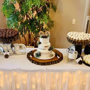 wedding cake and cupcakes