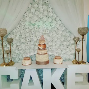 a three tiered cake on a table